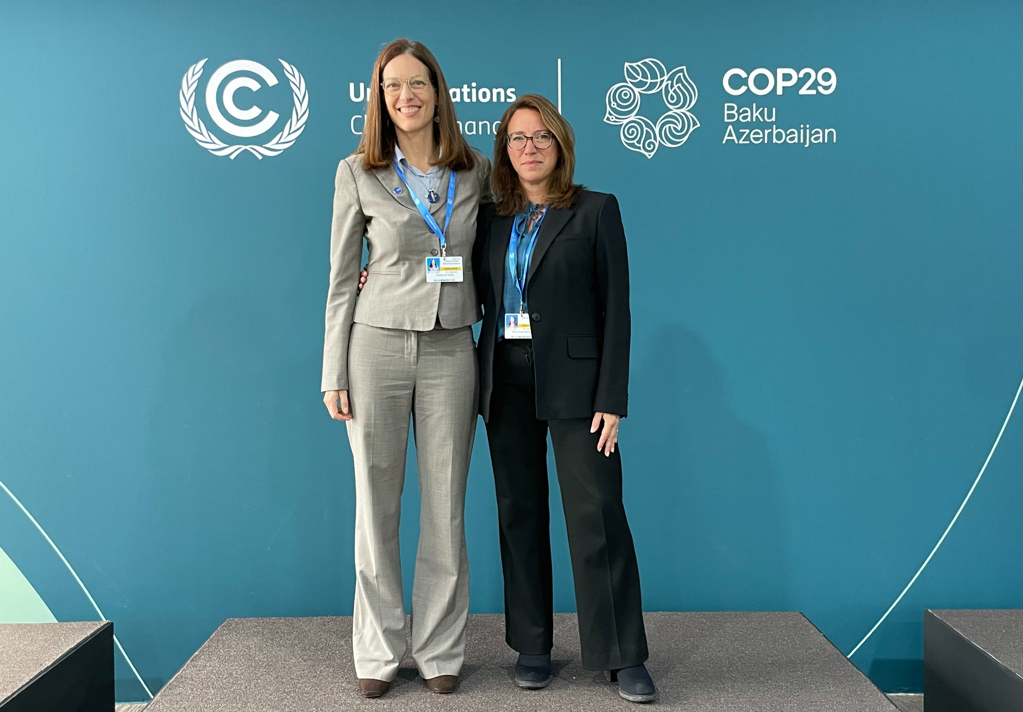 Cristina Gil White (left) and Sherry Madura (right) at COP29 in Baku